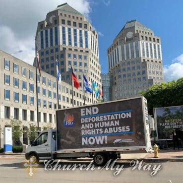 A mobile billboard is parked in front of Procter and Gamble headquarters during a demonstration in Cincinnati, Ohio. Photo courtesy of Stand.earth