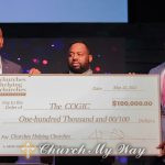 Church of God in Christ World Missions President Bishop Vincent Mathews, left, and COGIC Missions Elder Anthony Harris, center, receive a Churches Helping Churches donation check from AND Campaign President Justin Giboney, right, at Tabernacle Church of God in Christ in Southaven, Mississippi, on May 22, 2022. Photo courtesy of AND Campaign