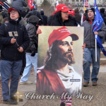 White #MAGA QAnon Jesus carried during the Jan. 6 invasion of the Capitol. Tyler Merbler / Flickr